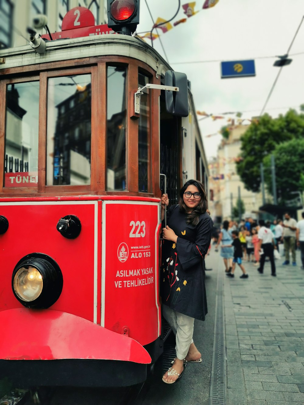 woman beside train