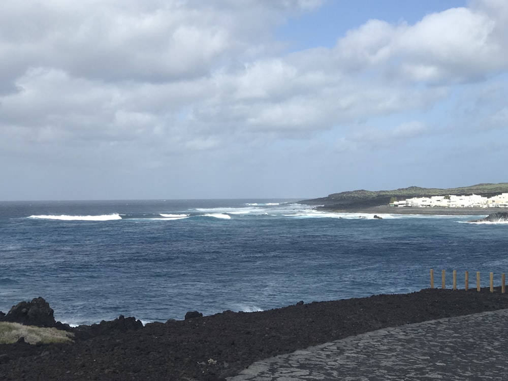 shore near blue body of water