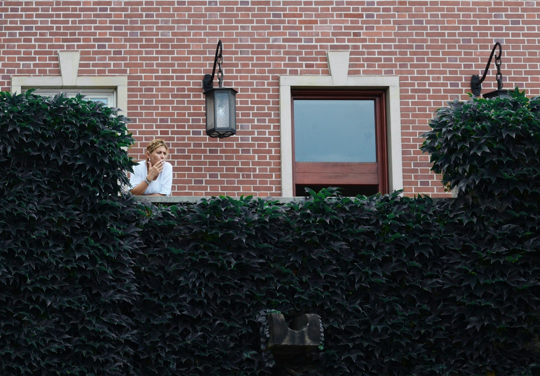 woman leaning on terrace