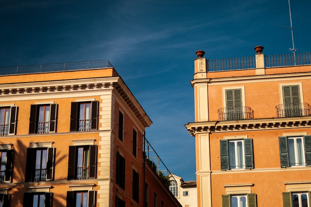 brown concrete buildings under blue sky