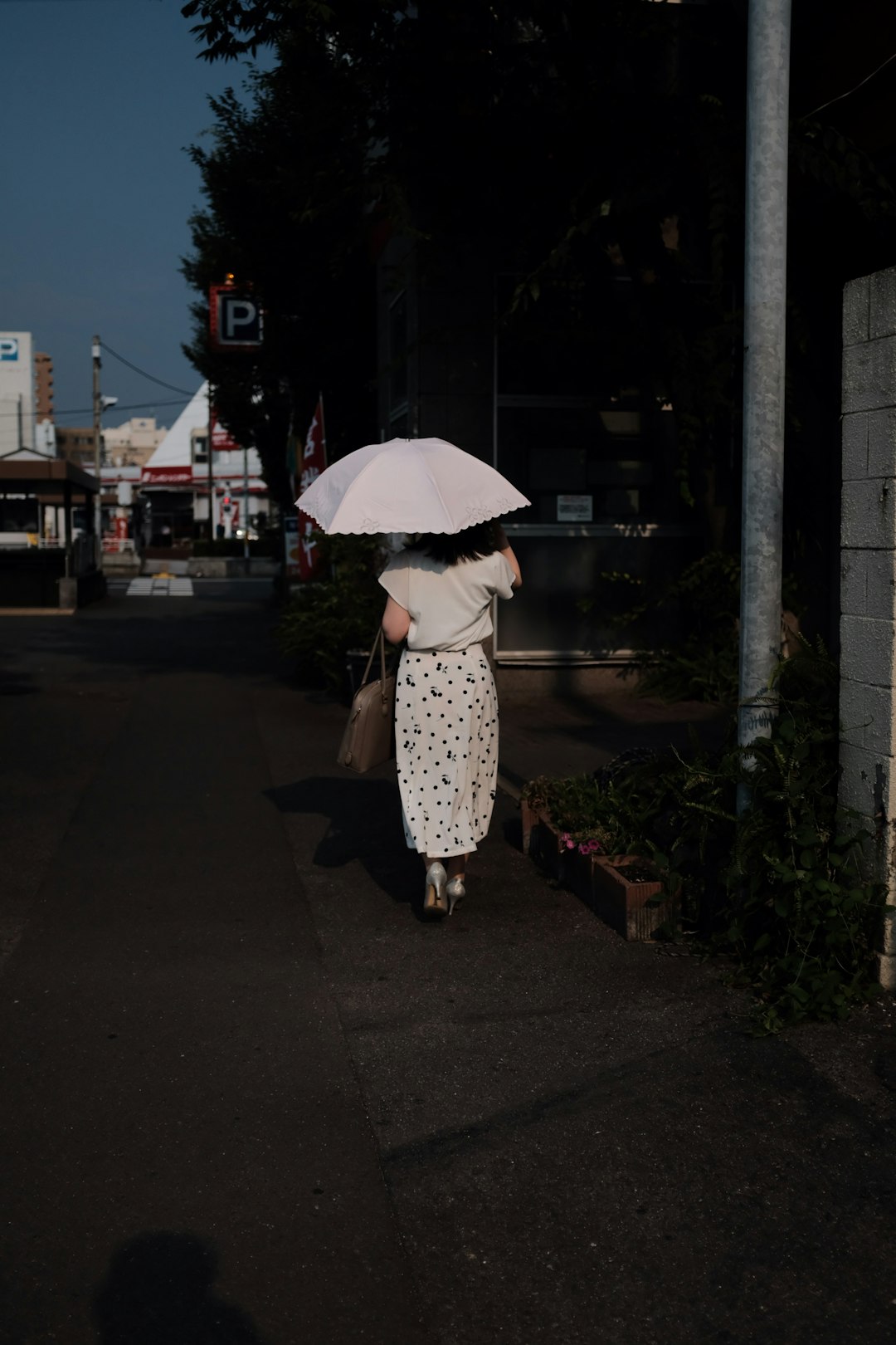 woman walking on street outside