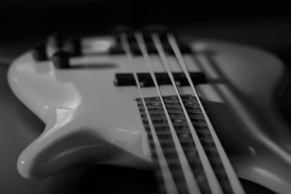 white electric bass guitar