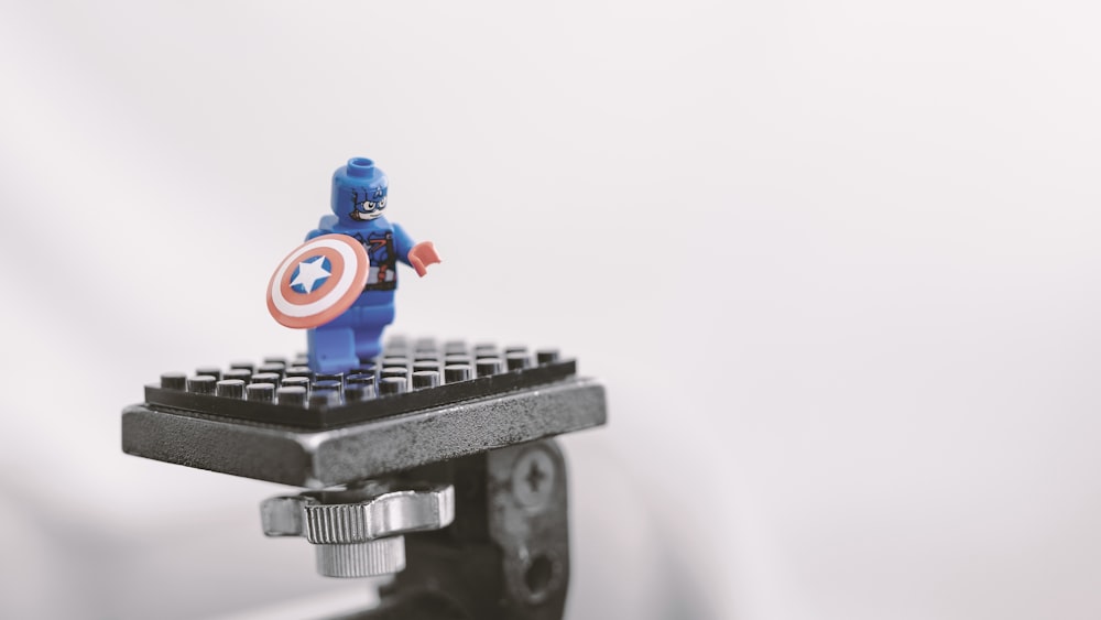 shallow focus photo of Captain America mini figure