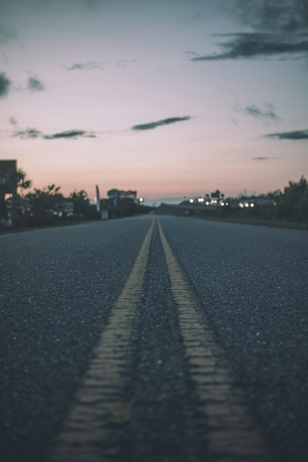 shallow focus photo of road