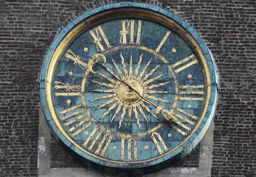 gold sun wall clock
