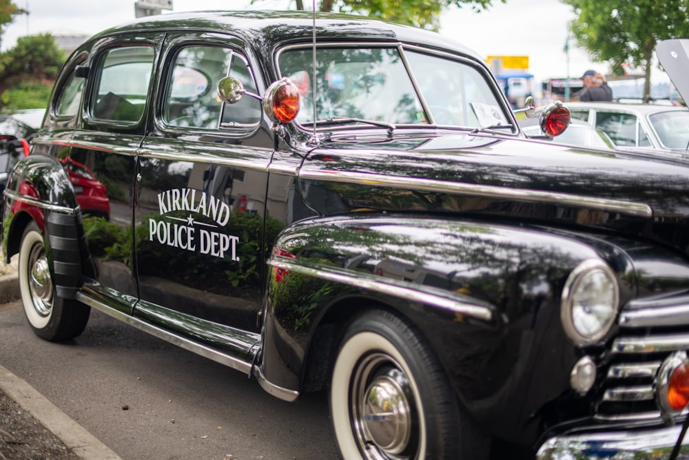 black antique sedan parking