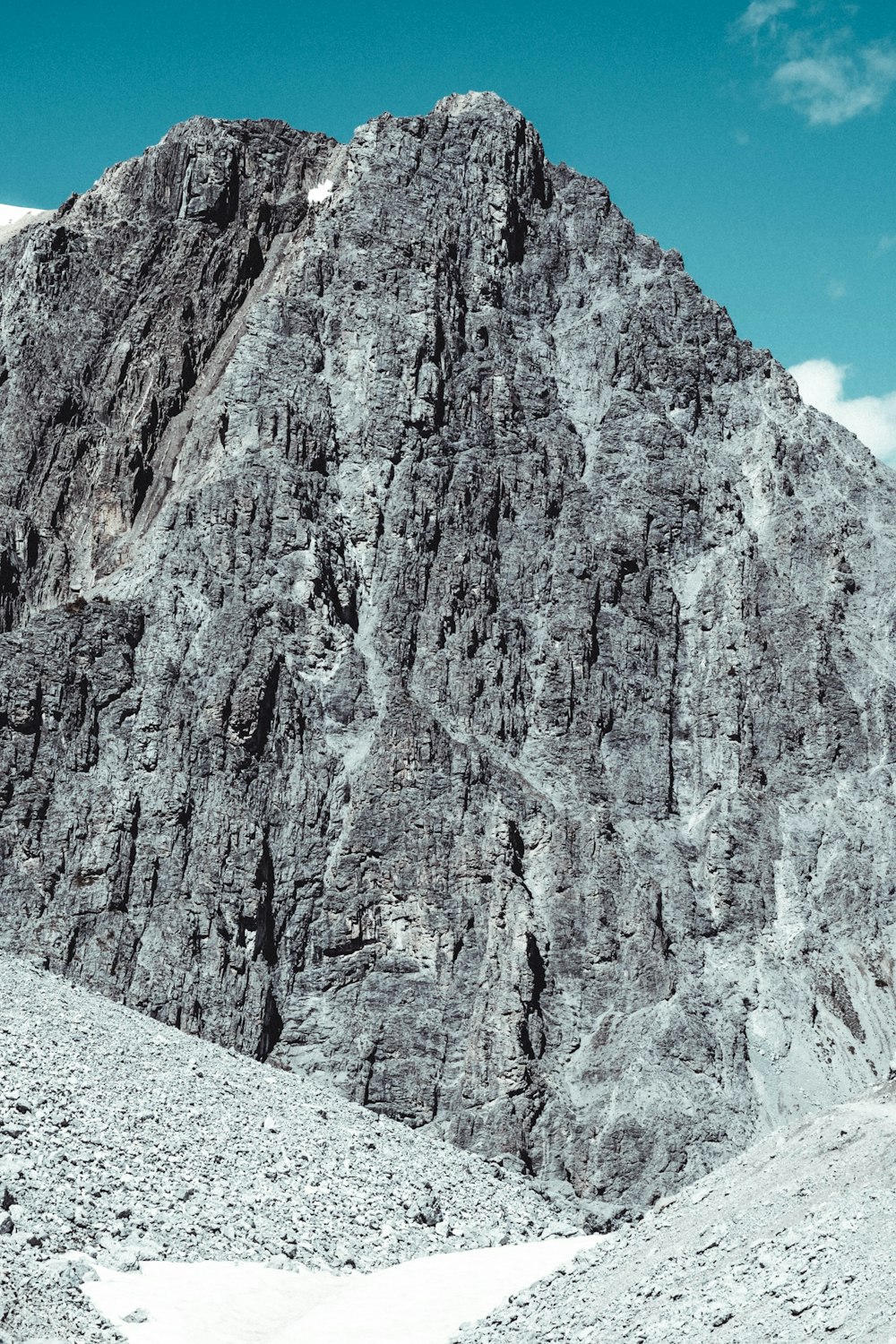 a very tall mountain with a sky background