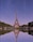 the eiffel tower is reflected in the water