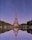 the eiffel tower is reflected in the water
