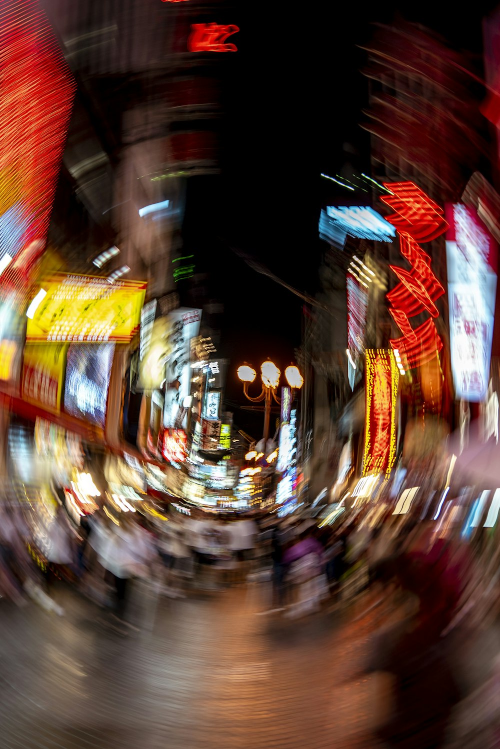 a blurry photo of a city street at night