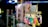 A variety of colorful items are displayed in plastic bags, hanging alongside packaged cotton candy. Each item is priced at 5000 as indicated by a sign. The scene is set in a bright, likely festive environment with various lights and decorations visible in the background.