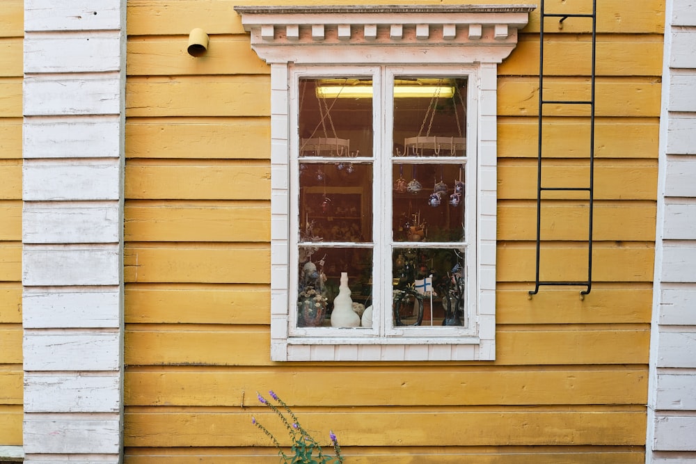 white framed glass window close-up photography