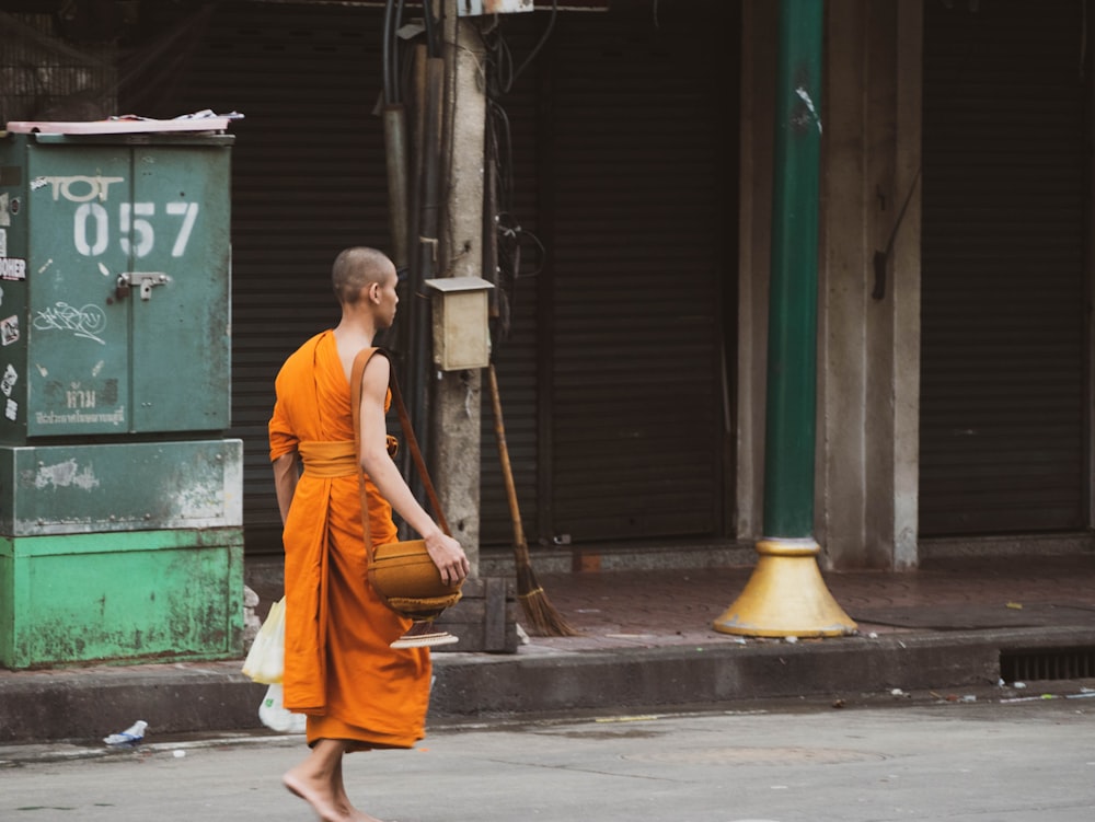 man walking near building