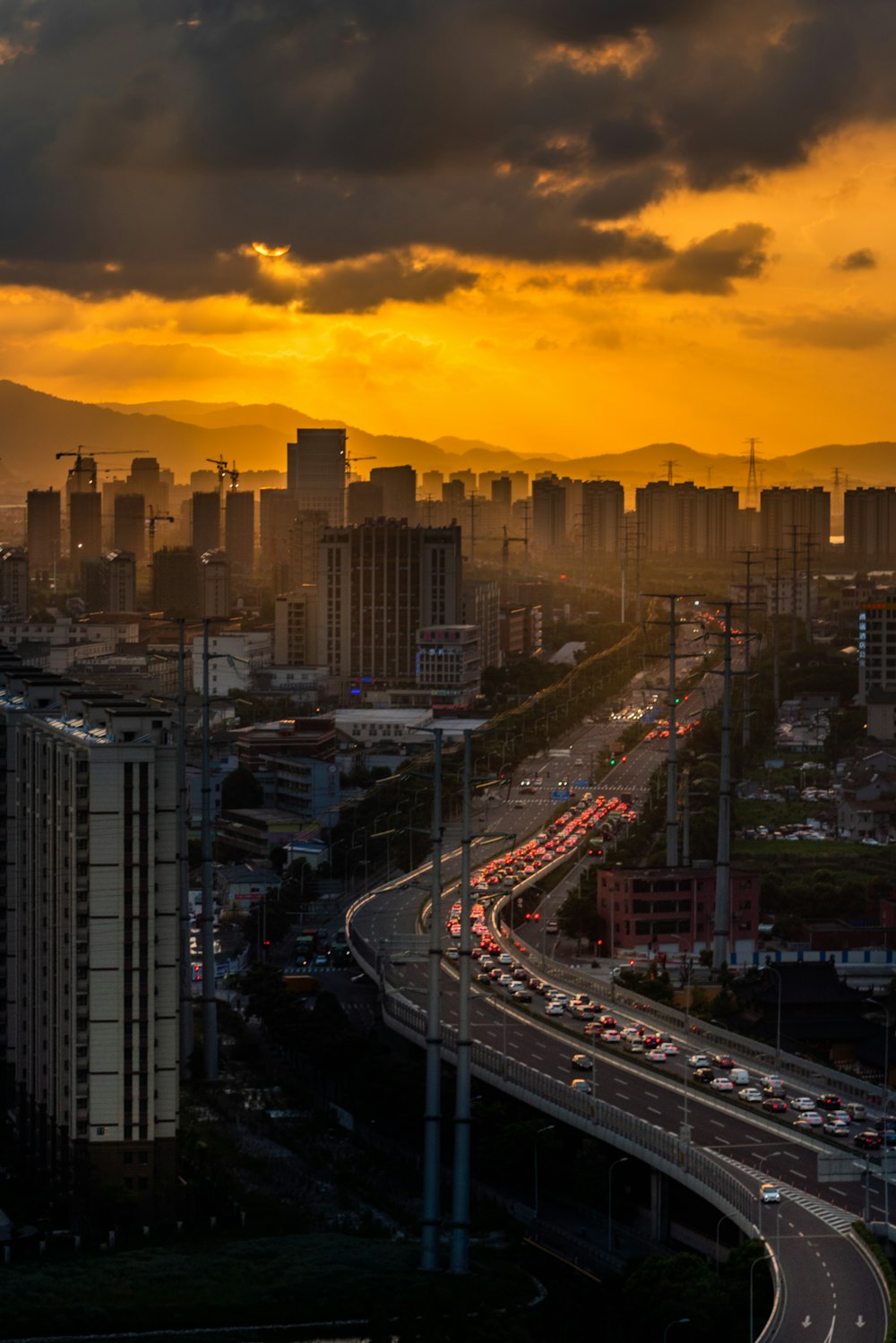 road between high buildings at golden hour