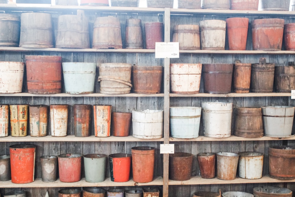 assorted-color pots on r