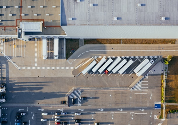 aerial view of vehicles in parking area