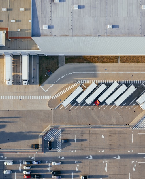 aerial view of vehicles in parking area