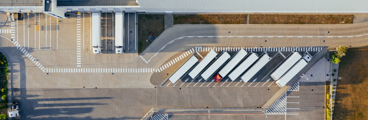 aerial view of vehicles in parking area