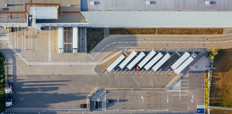 aerial view of vehicles in parking area