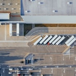 aerial view of vehicles in parking area