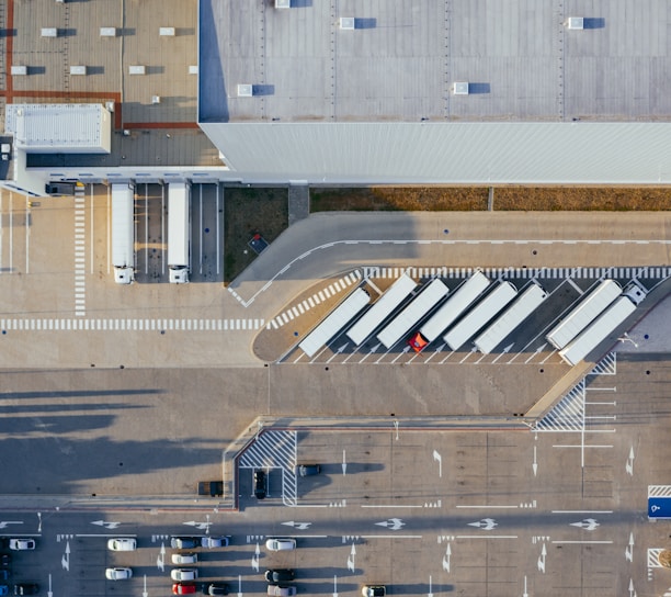 aerial view of vehicles in parking area