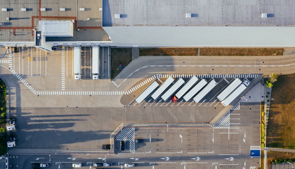 aerial view of vehicles in parking area