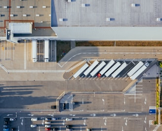 aerial view of vehicles in parking area