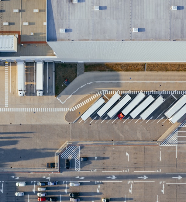 aerial view of vehicles in parking area