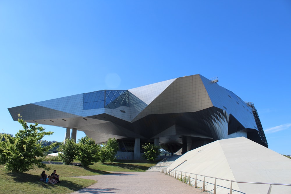 white and black concrete building under blue sky at daytime