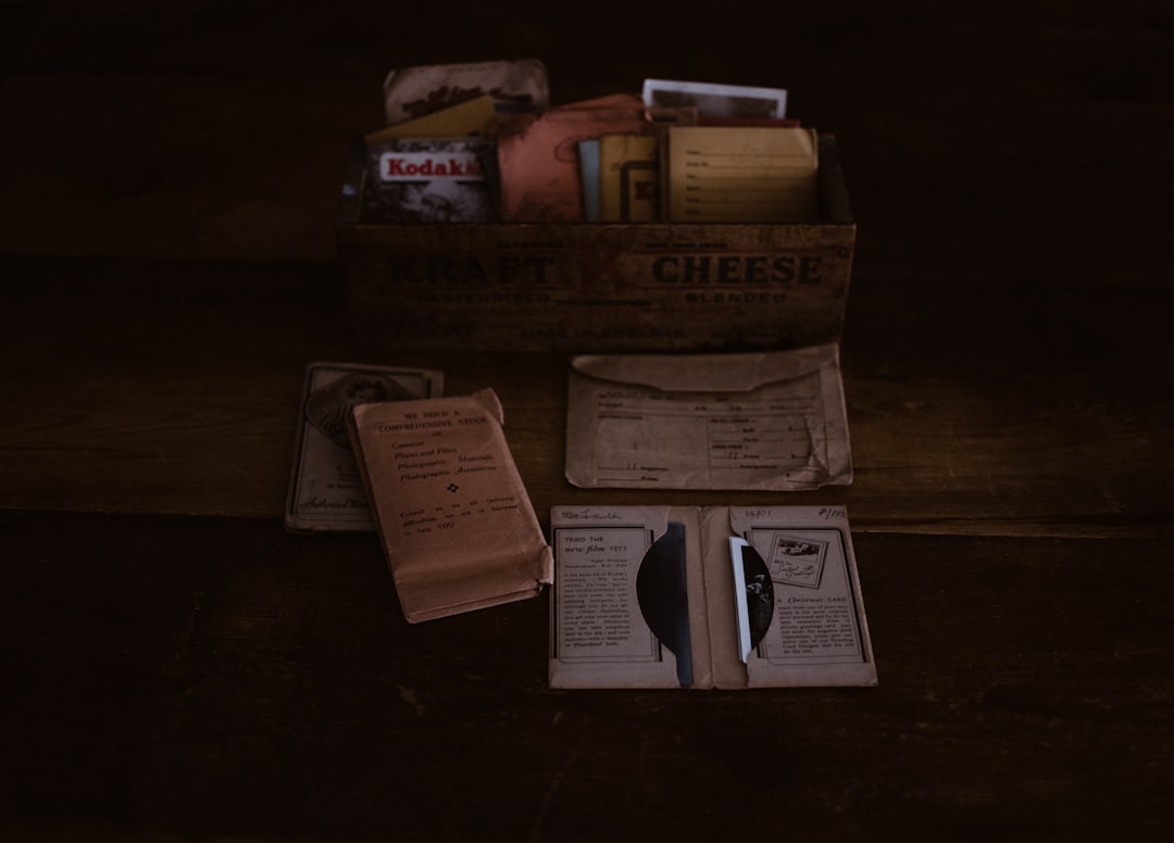 brown wooden crate with books, Vintage photograph bundle