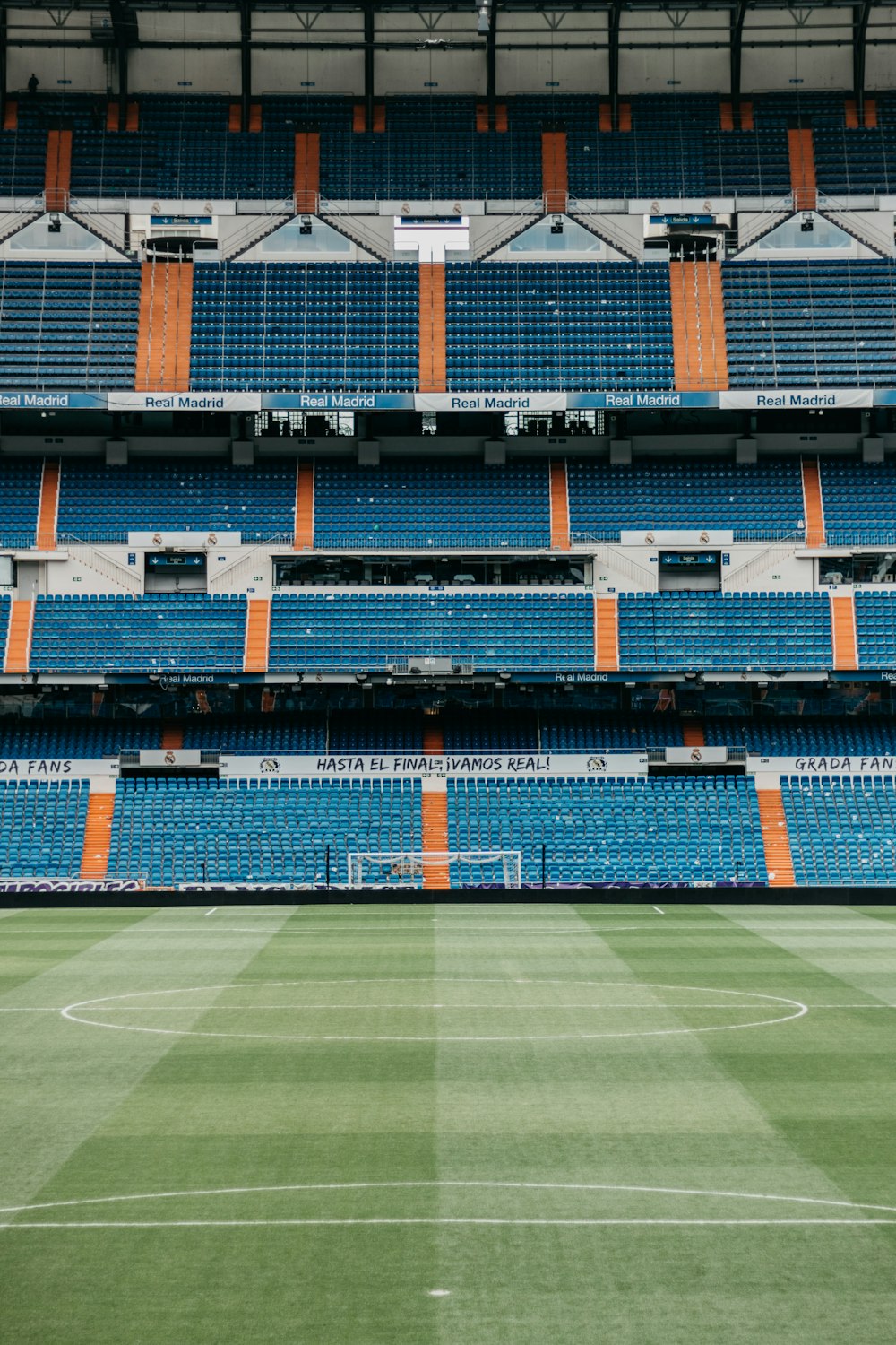 green, white and orange stadium seats