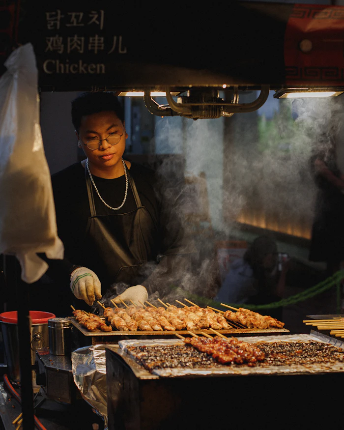 Placeholder portrait of a cook at the grill
