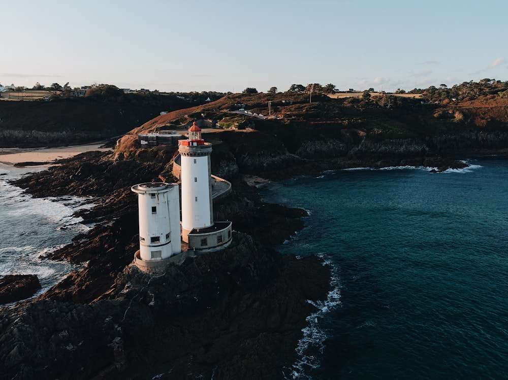 white lighthouse on island