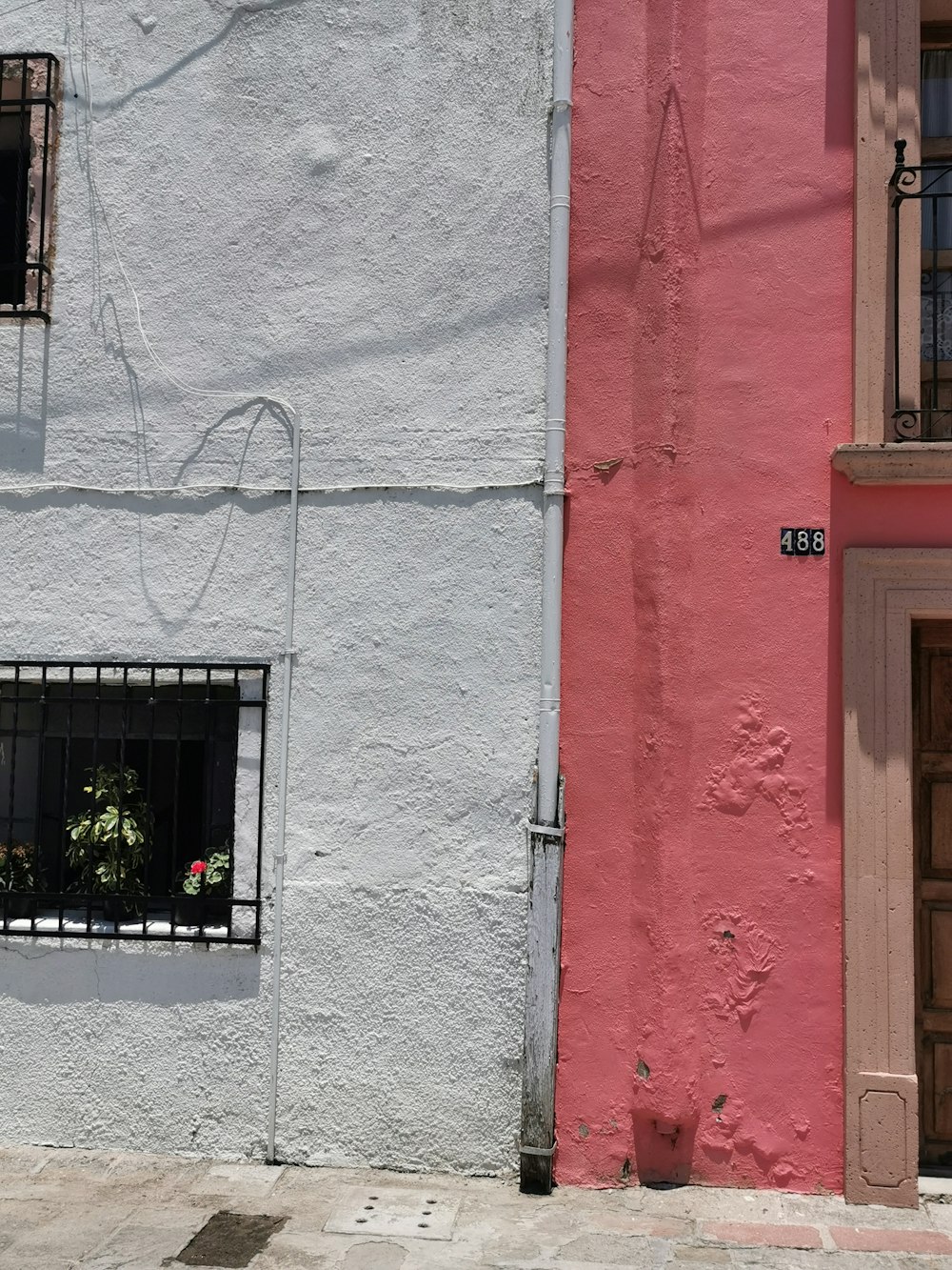 white and red building