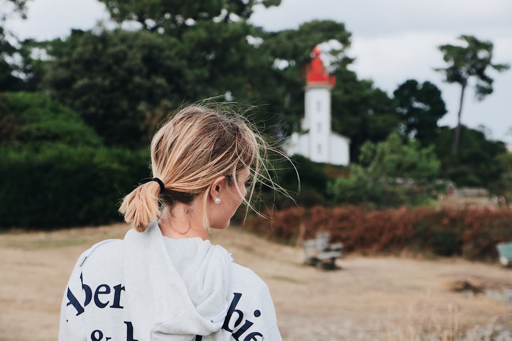 woman in white Abercrombie&Fitch hoodie