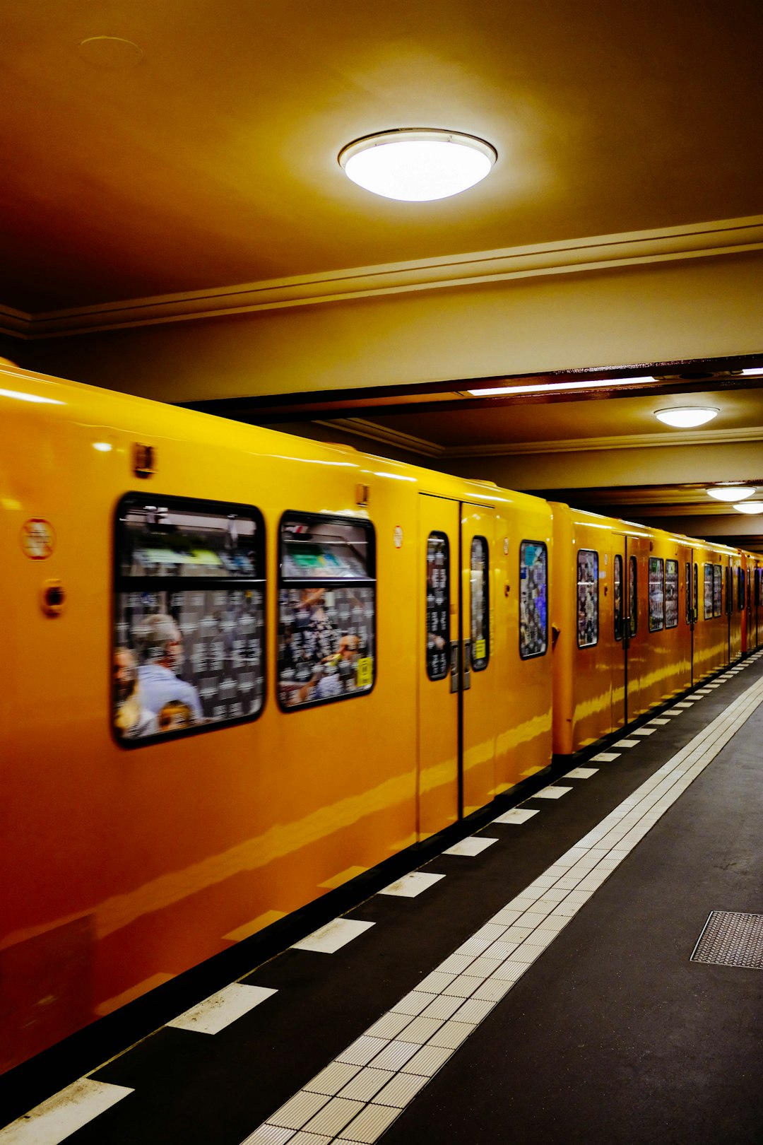 architectural photography of yellow and black train