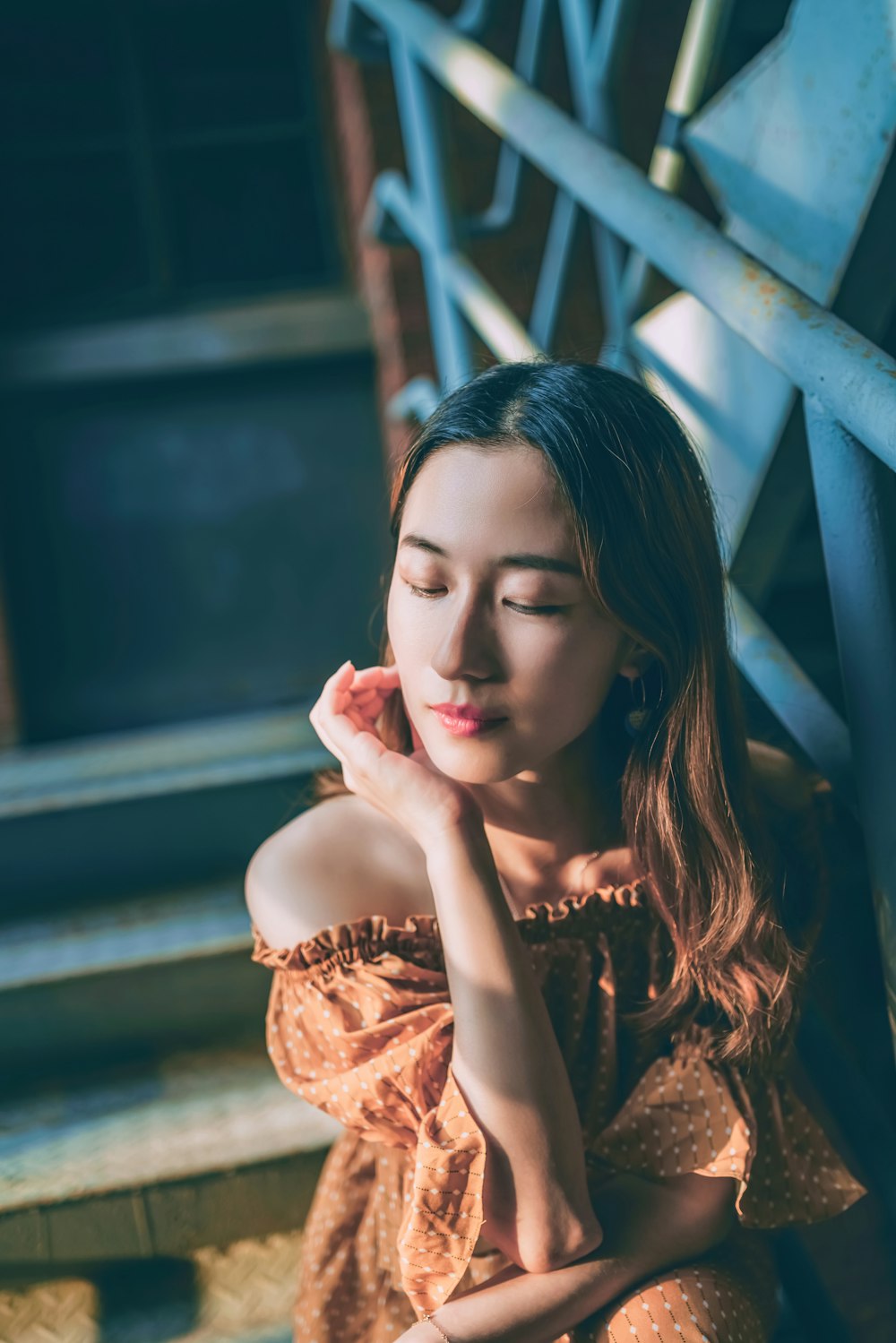 sitting woman on stairsx