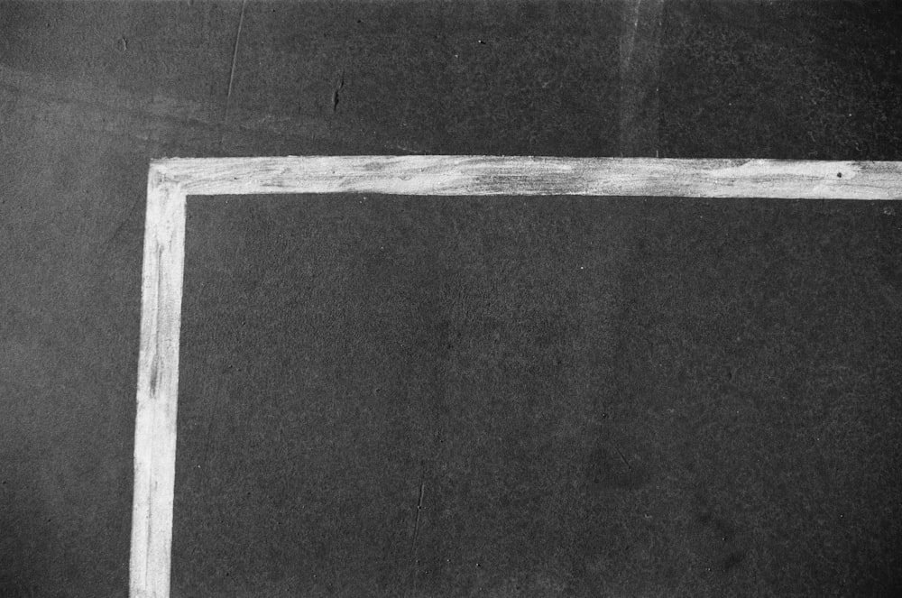 a black and white photo of a picture frame