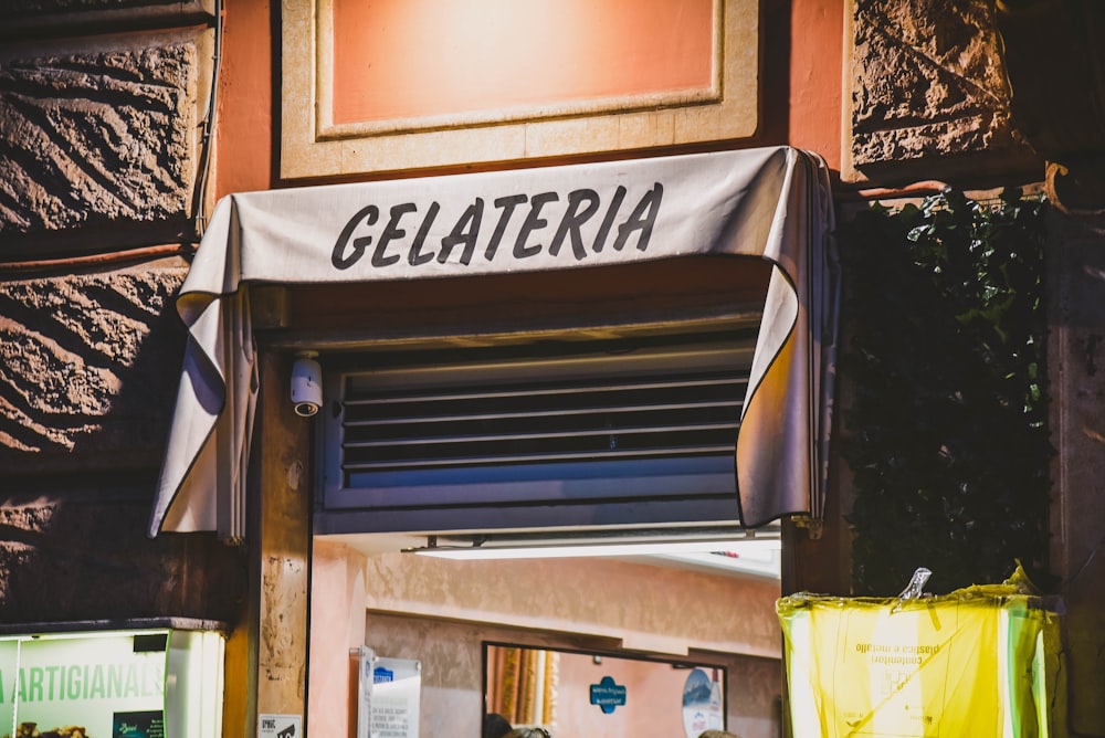 white and black Gelateria signage