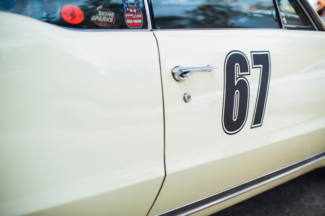 white car with 67 print