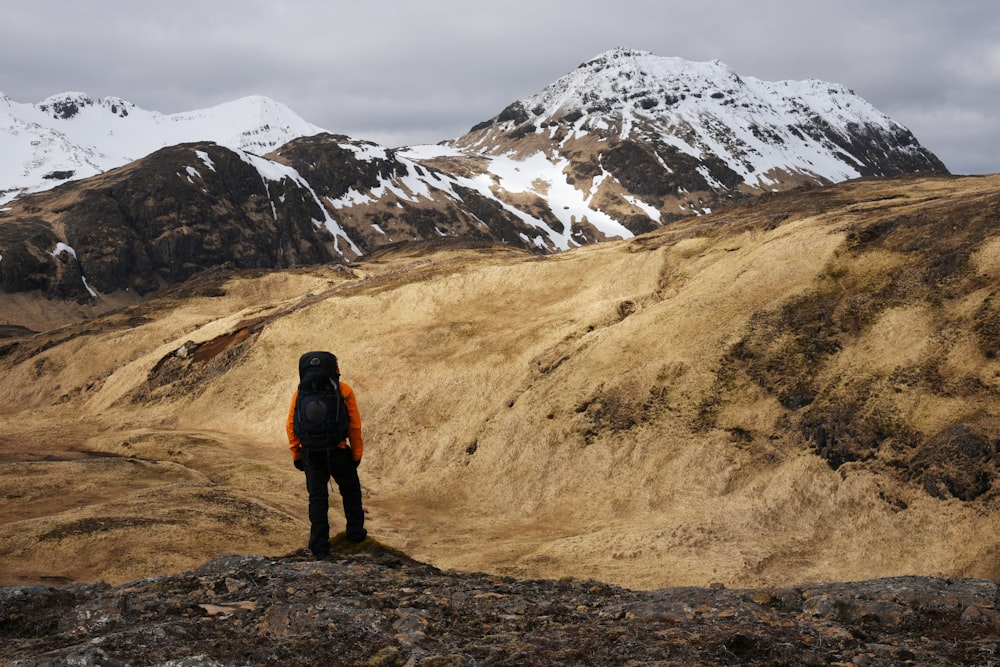 man standing on rock