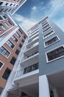 low-angle photo of blue building