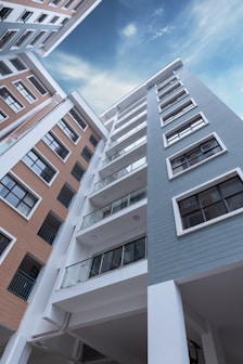 low-angle photo of blue building