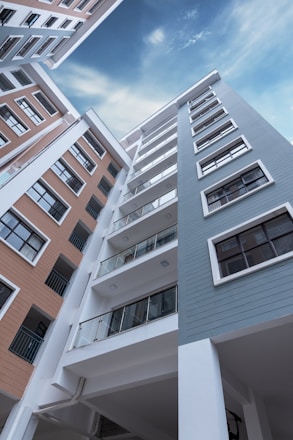 low-angle photo of blue building