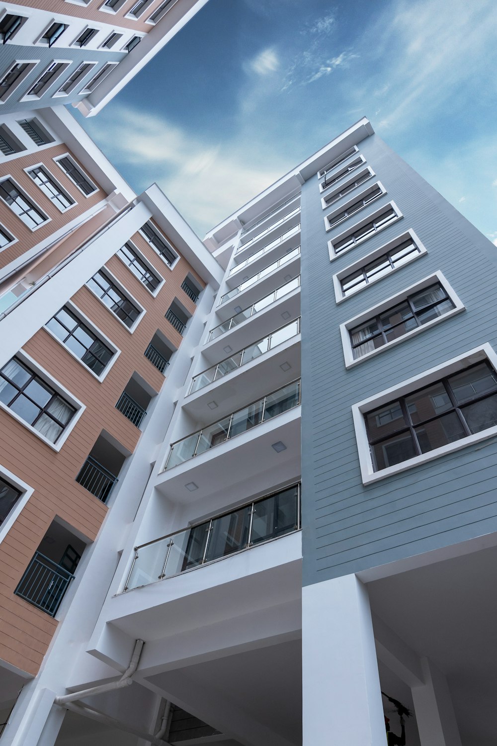 low-angle photo of blue building