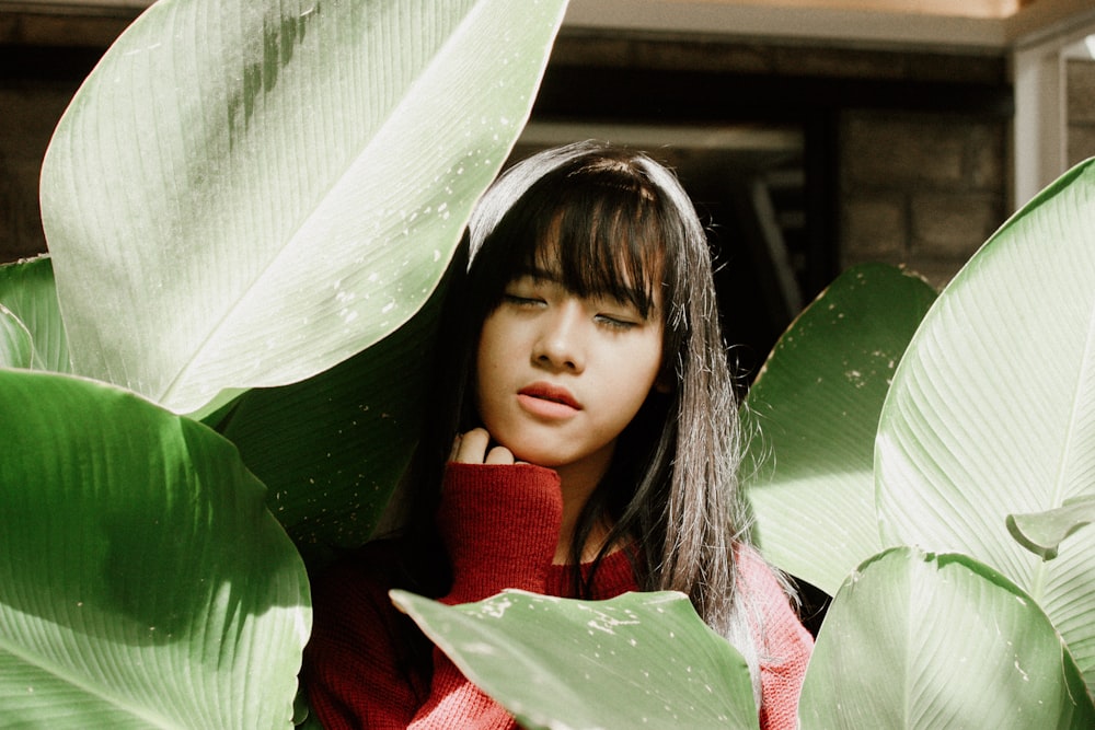 woman among leaves