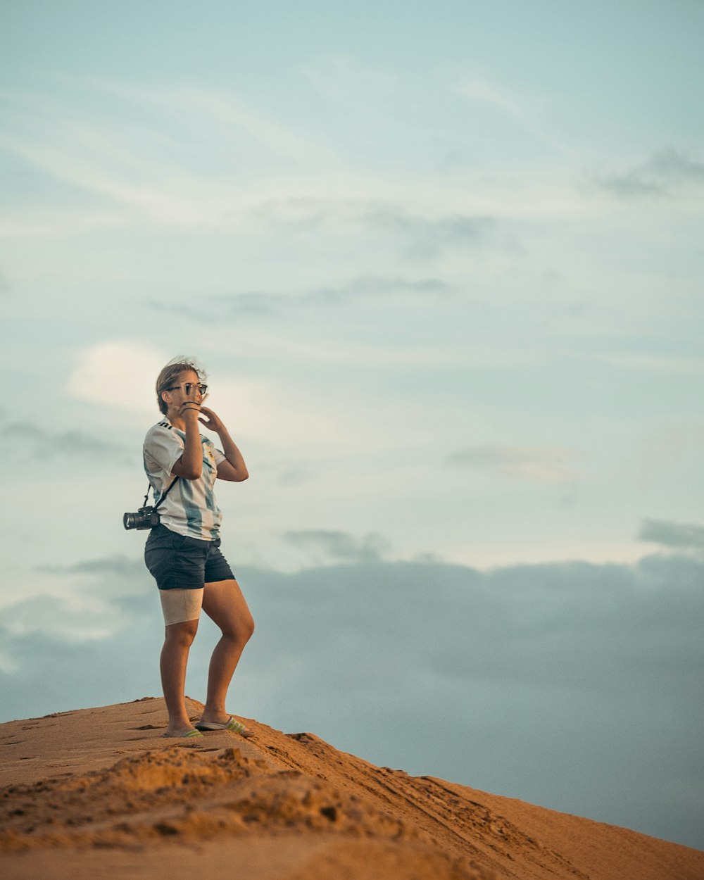 woman wearing white shirt and short-shorts