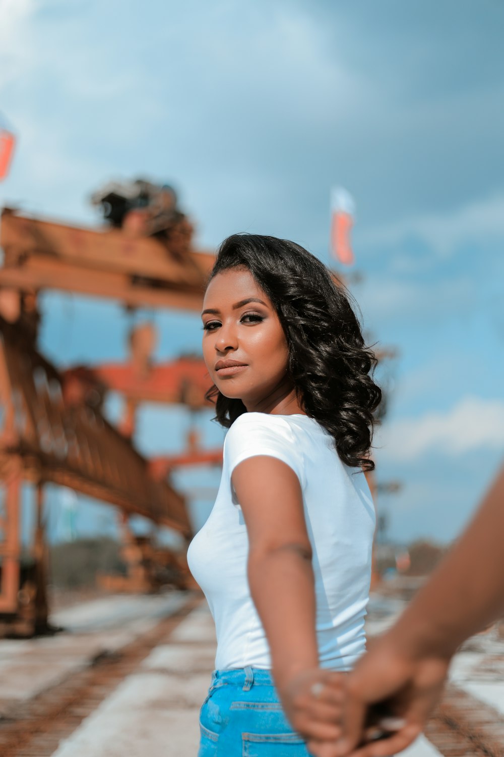 woman standing near building frame