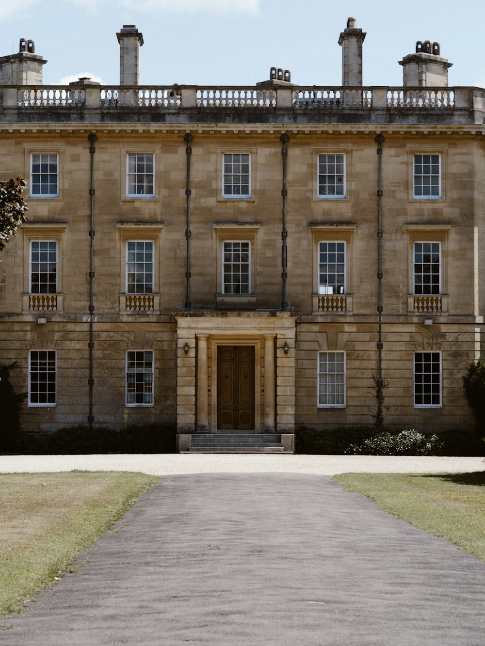 brown building with closed door