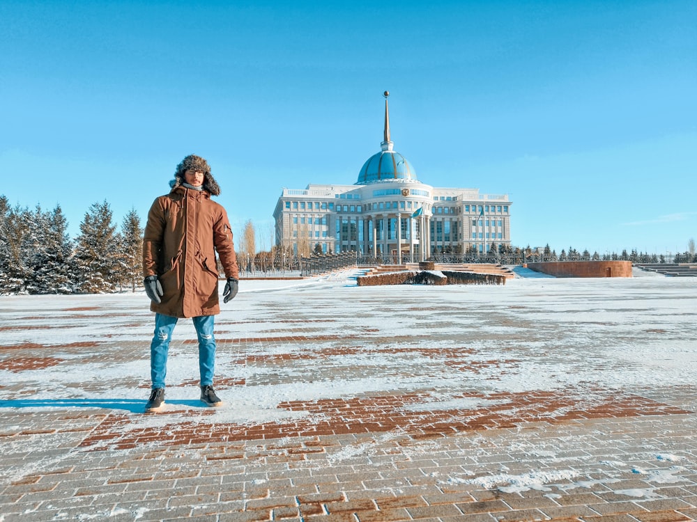 man standing near temple